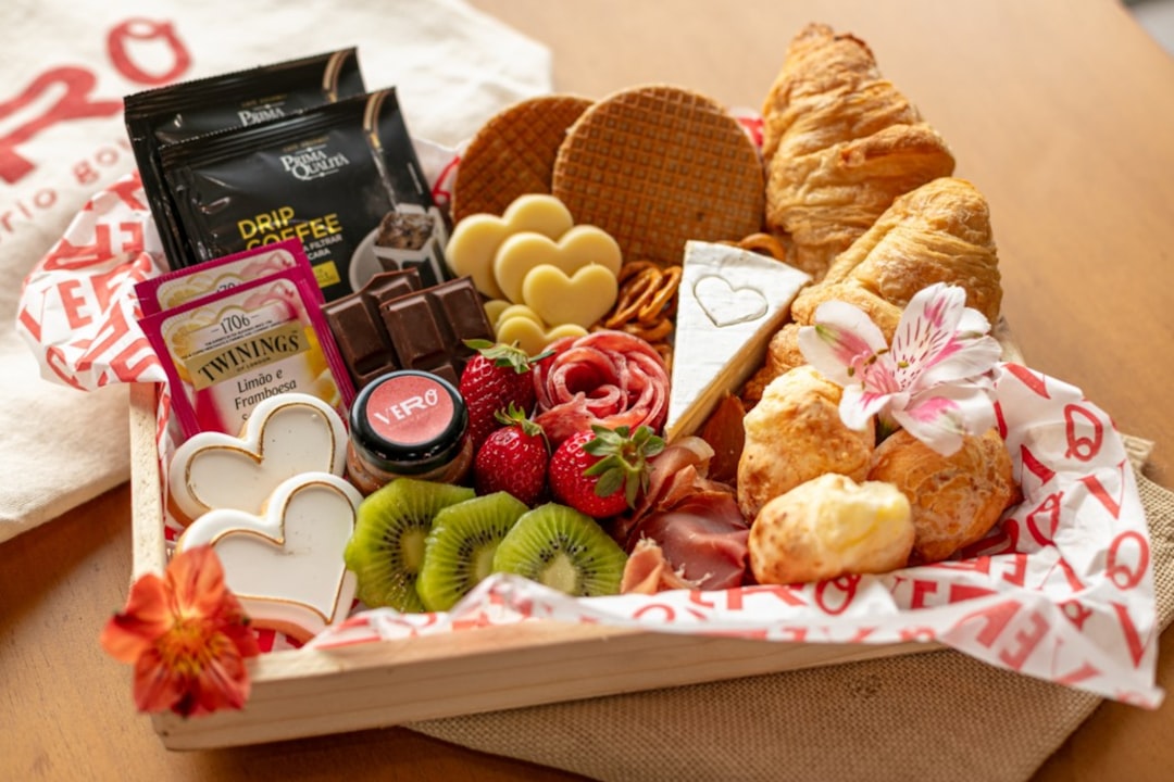 stats-img a-wooden-tray-filled-with-assorted-breakfast-pastries-and-fruits-qwrlbo3v440